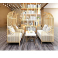 Explosion size custom LOFT light luxury golden bird cage iron sofa hotel rest double sofa table and chair combination